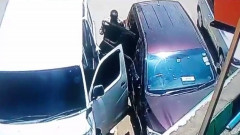Thugs breaking into a car. PHOTO/DCI